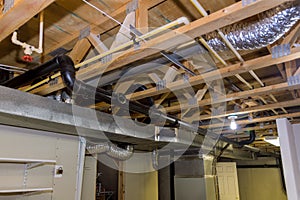 Framed home installation of air conditioner and heating ductwork in ceiling