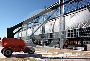 Framers Hang Structural Metal Studs from Manlifts