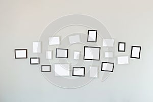 Frames hanging on white wall