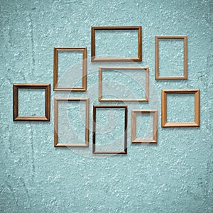 Frames on old blue wall
