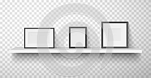 Frames, passepartout for photo, picture with white and black borders are on wall shelf. photo