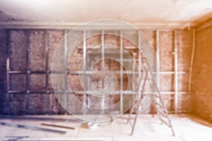 Blurred frames for plasterboard for making gypsum walls in apartment is under construction, remodeling, renovation