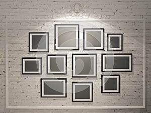 Frames on white brick wall