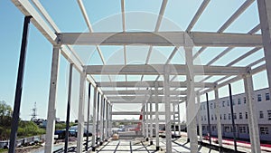 Framework On The Construction Site Of Modern Architecture Office Or Commercial Building Made Of Steel Reinforced