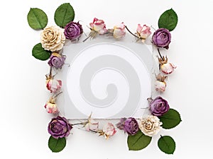 Framework with dry flowers on white background. Flat lay, overhead view