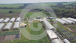 Frameworks of greenhouses, top view. Clip. Construction of greenhouses in the field. Agriculture, agrotechnics of closed