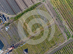 Frameworks of greenhouses, top view. Construction of greenhouses in the field. Agriculture, agrotechnics of closed ground