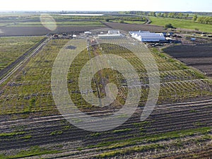 Frameworks of greenhouses, top view. Construction of greenhouses in the field. Agriculture, agrotechnics of closed ground photo
