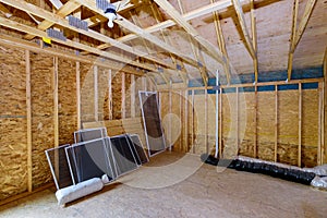 Framing beam of house attic under construction interior a walls ceiling material in wooden frame