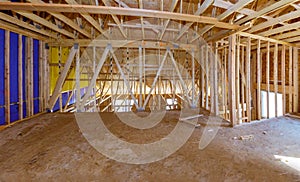 Framing beam of new house under construction interior of roof structure interior construction