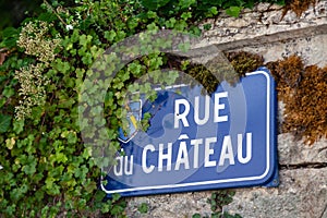 France Beaune 2019-06-20 Closeup authentic vintage steel or metal french street plate, french text - Rue de Chateau on vintage