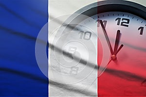 France flag with dial of a clock