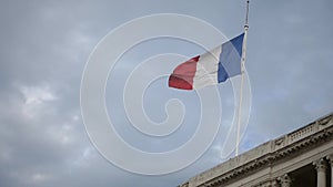 France flag waving on top of administrative building