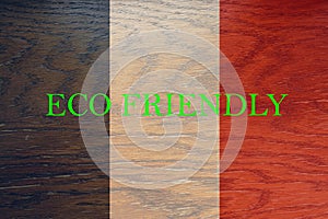 France flag on wooden background for global eco friendly environment, ecological and environmental saving and go green country