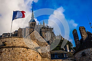 France. Normandy. Mont Saint-Michel. French flag