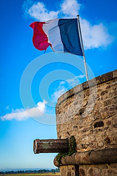 France. Normandy. Mont Saint-Michel. French flag