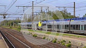 France, Paris 05 October 2022: A video of one of the modern commuter rail fast speed trains arriving train station