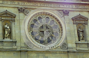 France, Paris, Boulevard des Invalides, St Francis Xavier's Church, stained-glass window and two statues on the facade