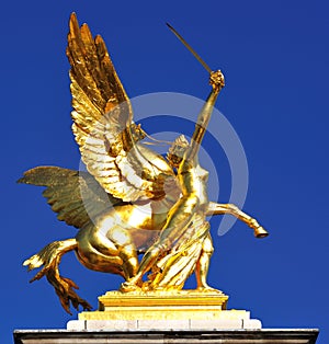 France; Paris ; bronze and golden leaf statue