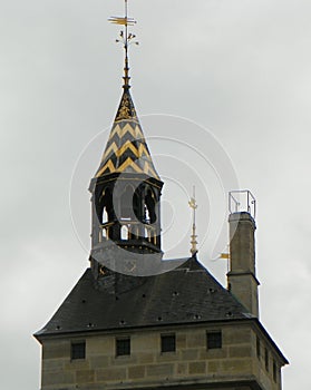 France, Paris, Palais de la Cite, Horloge Tower top with a clock and weather vane