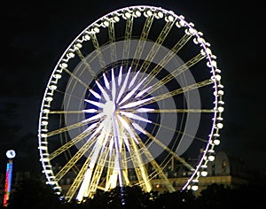 France, Paris, Place de la Concorde, view of the Big Wheel at night