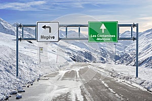 France ski town Megeve and Les Contamines - Montjoie road big sign with a lot of snow and mountain sky photo