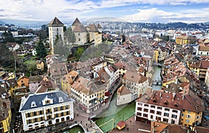 France travel and landmarks. Romantic beautiful old town of Annecy aerial drone view