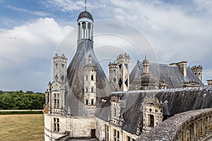 France. View from the upper terrace on the roof and decorated chimneys Chambord, 1519 - 1547 years. UNESCO World Heritage List.