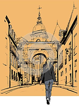 France - Woman strolling in an old city photo