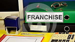 Franchise. Text label on the Registrar`s office folder. photo