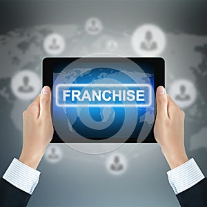 FRANCHISE word on tablet pc screen