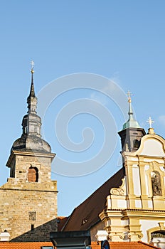 Franciscan Monastery in Plzen, Czech Republic with light blue sky in background. The church and monastery are among the city`s