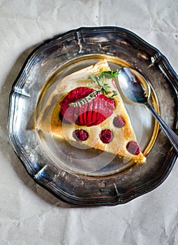 Frangipane cake on metallic plate