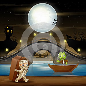 Frankenstein and mummy in halloween night background