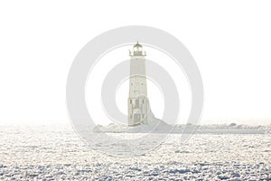 Frankfort North Breakwater Lighthouse on foggy Lake Michigan in