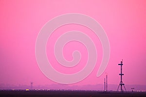 Frankfurt Airport at sunrise, pink sky, FRA, runway view photo