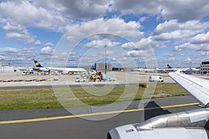 View to parking Lufthansa cargo aircraft at the apron at Frankfurt international airport