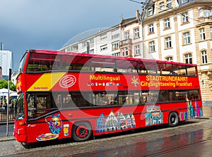 Frankfurt, Germany - June 15, 2016: A double-decker tourist sightseeing bus at Paulsplatz square in Old Town.