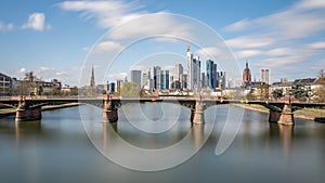 Frankfurt, Germany - March 31, 2020: frankfurt skyline view with ignas bubis bridge during daytime photo