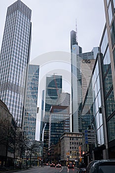 FRANKFURT-AM-MAIN, GERMANY - MARCH 2020: Skyscrapers in financial district in fog rainy day. Skyline of big modern city