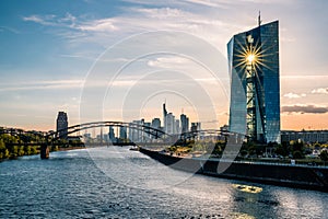 Frankfurt am Main, view across the river over the European Central Bank. ECB, in the background with the skyline and a sunset