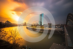 Frankfurt am Main, view across the river over the European Central Bank. ECB, in the background with the skyline and a sunset