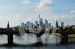 Frankfurt skyline behind the Ignatz Bubis Bridge on the River Main photo