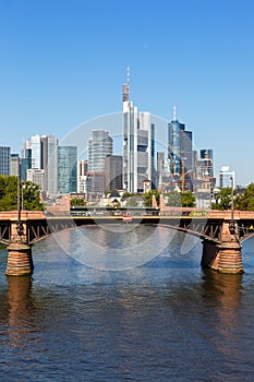 Frankfurt skyline with Main river and Ignatz Bubis Bridge travel traveling portrait format in Germany photo
