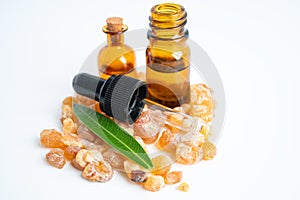 Frankincense or olibanum aromatic resin isolated on white background used in incense and perfumes