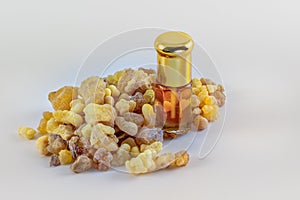 Frankincense resins and frankincense oil isolated photo