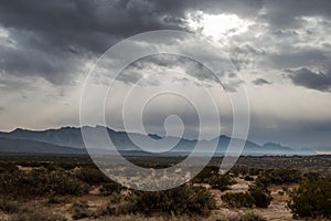 Franklin Mountains under dark gloomy sky