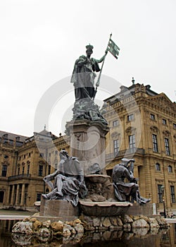 Frankonianbrunnen, sculptures decorated neo-baroque fountain, in front of the Archbishopric Palace, Wurzburg, Germany