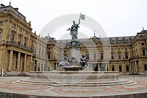 Frankonianbrunnen, sculptures decorated neo-baroque fountain, in front of the Archbishopric Palace, Wurzburg, Germany