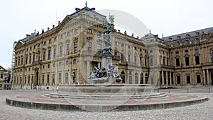 Frankonianbrunnen, sculptures decorated neo-baroque fountain, in front of the Archbishopric Palace, Wurzburg, Germany photo